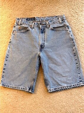 Levis 550 Light Wash distressed Denim Shorts Made in USA. W 32” L 11”